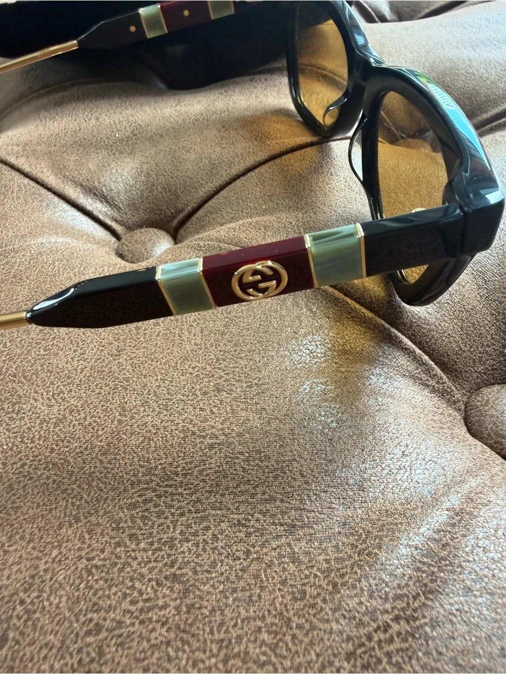 Gucci Black Frame Sunglasses with Amber Lenses